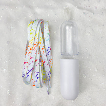 Close-up of splash colorful shoe laces showing vibrant paint splatter effect
