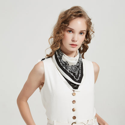 Scarvii Geometry Scarf Head Wrap styled on a woman with geometric patterns in neutral tones