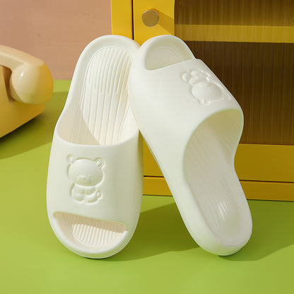 Slipeer Lucky Bear Summer Slippers arranged with summer accessories